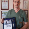 Роман Мяконький с монографией «Профессиональное становление начинающего хирурга. Проблемы и решения» 